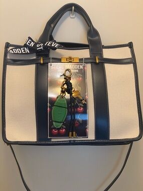 Steve Madden Navy and Cream Satchel with Green Charm